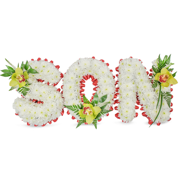 A meticulously composed three-dimensional floral tribute spells out the word SON in bold white letters, each formed from tightly packed white chrysanthemums whose uniform petals create a sculpted, velvety expanse. The arrangement sits against a clean white backdrop so every contour is visible: the letters' rounded surfaces throw soft shadows and the chrysanthemums' fine textures invite quiet attention. A continuous ribbon of vivid red is woven around the perimeter of each letter and follows the circular opening of the O in scalloped loops, introducing a striking, heartfelt contrast that visually punctuates the purity of the white blooms.
Strategically placed to anchor the composition are three yellow-green Cymbidium orchids with delicate reddish-brown throats-one tucked into the upper left curve of the S, another cradled at the base of the O, and the third positioned on the upper right of the N-each accompanied by a cluster of glossy green leaves and airy fern fronds. The orchids' waxy texture and subtle scent temper the crispness of the chrysanthemums, while the ferns add fine line detail and natural movement, drawing the eye along the letters' strokes.
Seen through the lens of a Plaistow florist who often works near Barking Road and Plaistow Park, this piece reads as a quiet, handcrafted expression of mourning and love. It speaks to families seeking a personalised, respectful tribute-an arrangement whose materials, form, and colours are chosen with both skill and compassion.