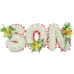 A lovingly crafted, three-dimensional floral tribute spells the word SON in bold block letters, each letter sculpted from hundreds of small, pristine white chrysanthemum blooms that form a soft, cloud-like surface. The chrysanthemums' tight, rounded petals read as a pure, luminous field, their matte white texture catching soft studio light so the letters feel both tender and dignified against a plain white background. Tracing the outer edges and the inner curve of the O is a continuous scalloped border of vivid red ribbon, carefully pleated to create a rhythmic contrast-this warm red edge frames the white and lends a quiet sense of devotion and love common to memorial pieces.
Accenting each letter are three lime-green Cymbidium orchids, their waxy petals glazed with a subtle sheen and marked at the throat by a blush of reddish-brown. One orchid nestles into the upper curve of the S, another cradles the base of the O, and a third punctuates the upper stroke of the N; each sits among sprigs of lush green foliage and delicate fern fronds that trail with gentle movement, adding vertical height and organic flow. The cool green of the orchids and leaves gives depth against the snowy chrysanthemums and echoes the comfort of nature.
As a local florist familiar with Plaistow and nearby West Ham Park, I imagine this arrangement placed beside a photograph at a service or laid at a graveside to honour a son. The piece conveys purity, remembrance, and quiet strength-an expression of love shaped by careful craftsmanship and thoughtful material choices that readers on this site will immediately recognise.